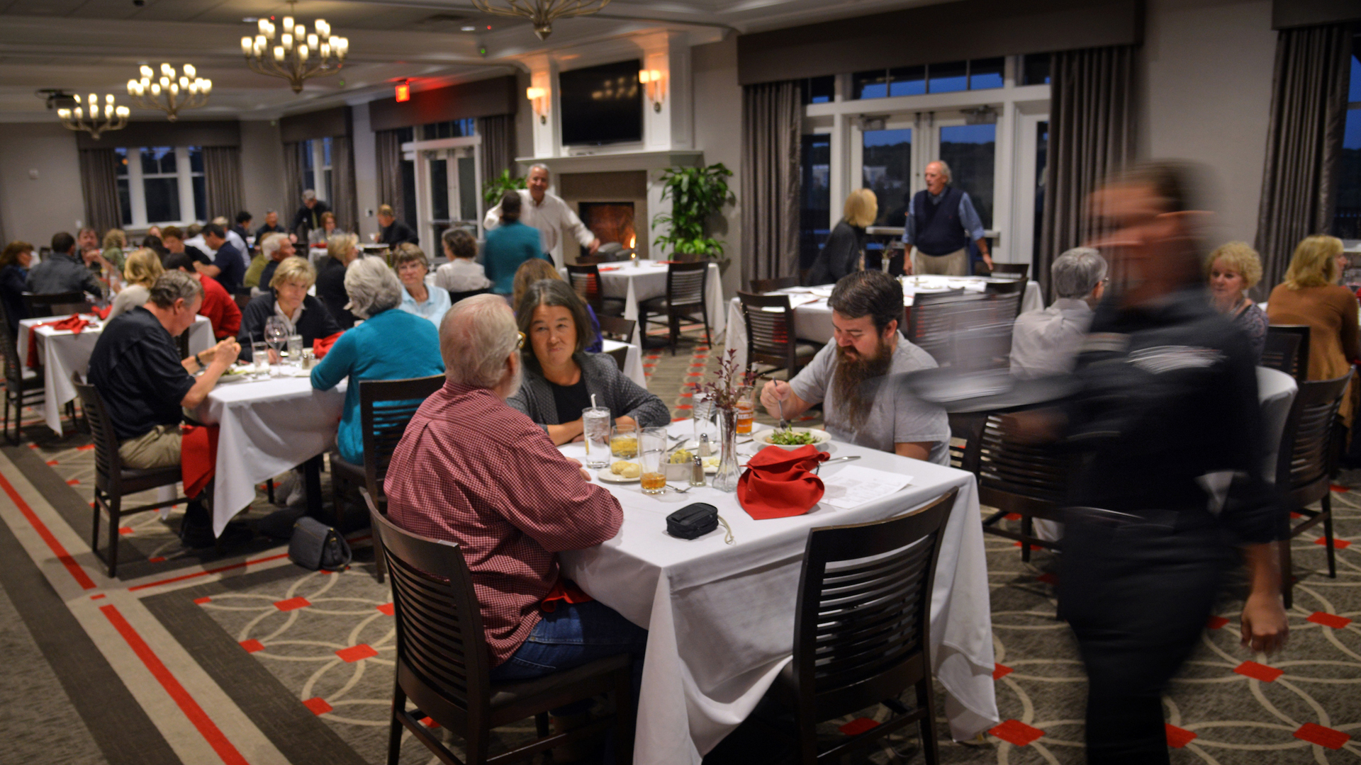 Groups of working professionals dine during a lively evening at the Terrace Dining Room.