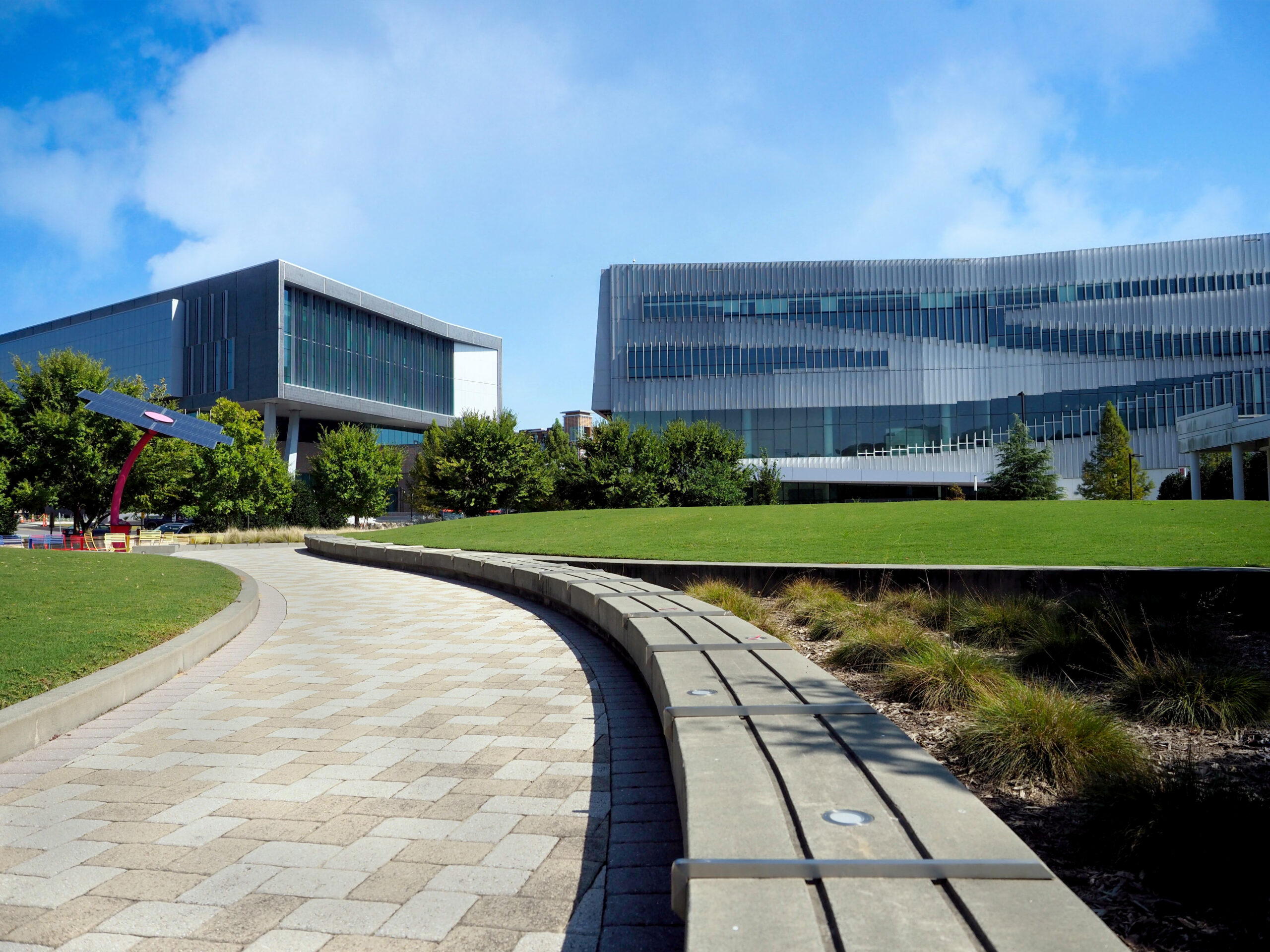 A walkway leads to the Hunt Library (right) and the newly completed Fitts-Woolard Hall on Centennial Campus.